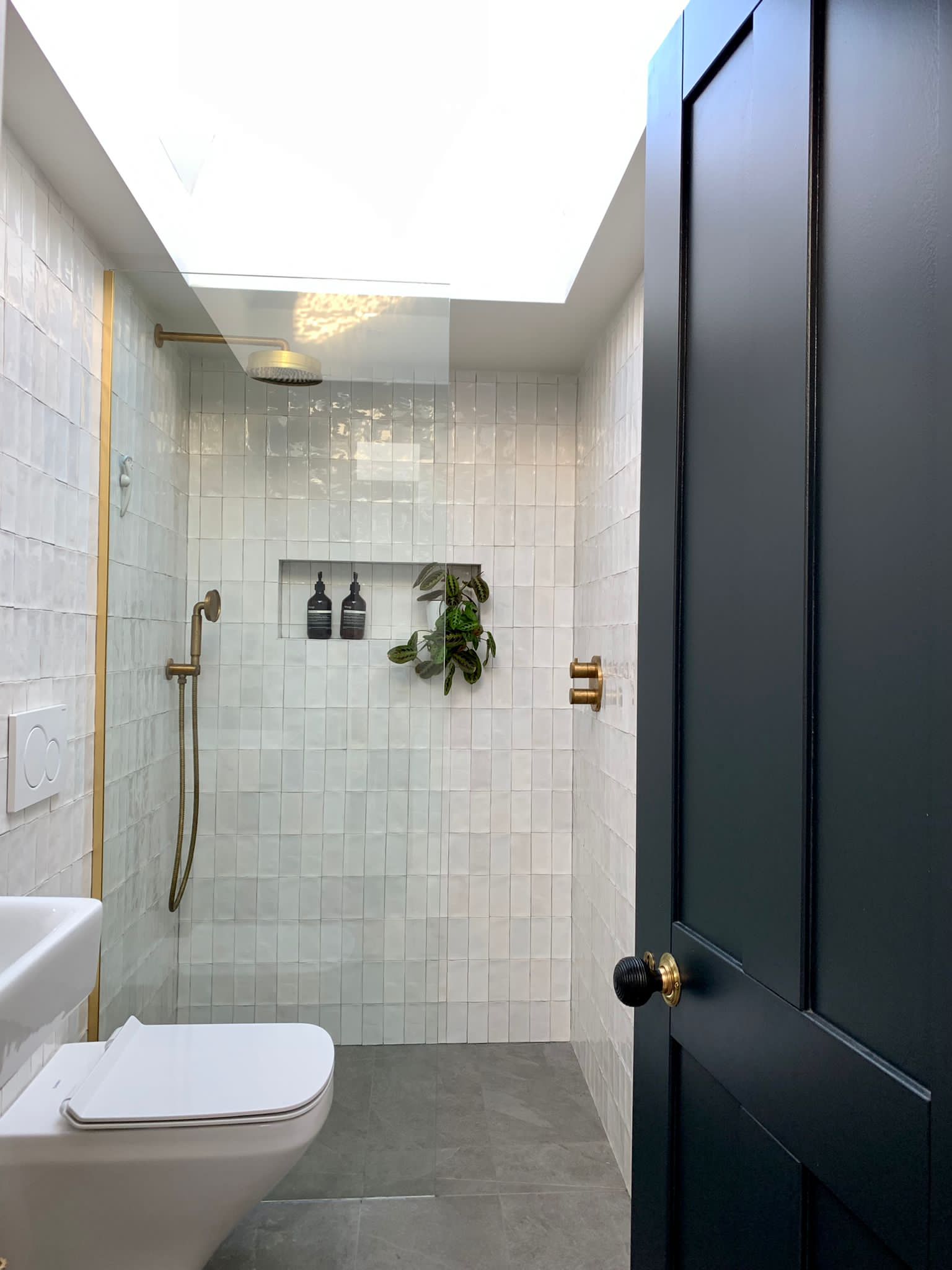 Walk in shower with handmade look tiles, roof light and brushed brass shower, Hanwell W7