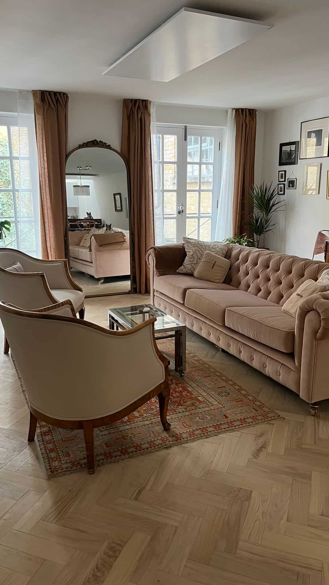 Living room with herringbone floor, French doors and full height arched mirror, Hanover Place E3