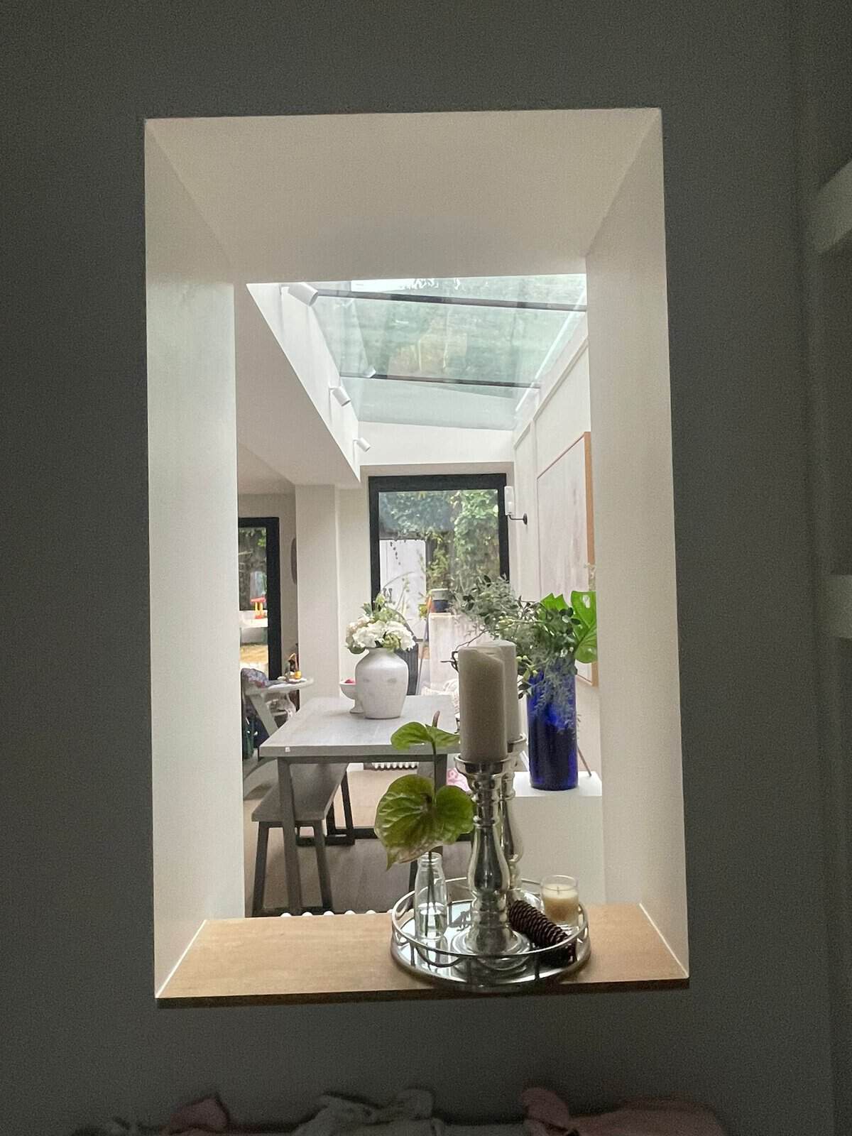 Internal window looking through to the dining area of a rear extension, N4